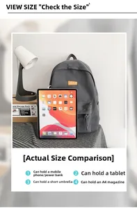 Detailed view of grey backpack size comparison with a tablet and A4 magazine capacity