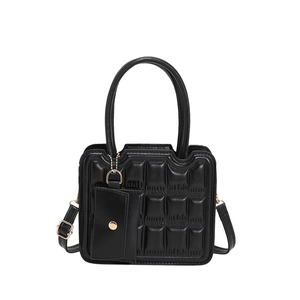 Chic black quilted crossbody bag with a mini pouch and top handle on white background