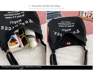 Detail view of large canvas tote bag showing spacious inner compartment with metal snap button