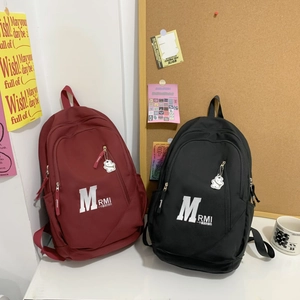 Retro canvas backpacks in burgundy and black with cute bear charms for students