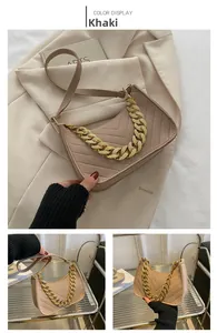 Detailed views of khaki quilted shoulder bag with chunky gold chain and strap