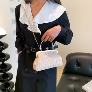 Chic beige woven crossbody bag with gold metal handle and pearl accents for women
