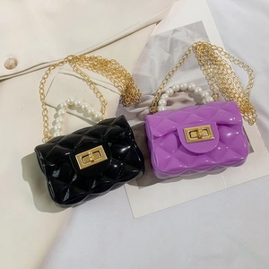 Mini quilted jelly handbag with pearl handle and chain strap in black and purple colors