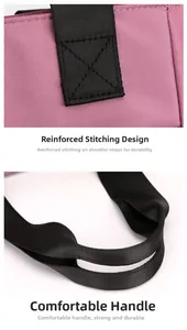 Détail de couture renforcée et poignée en nylon noir confortable sur un sac fourre-tout rose
