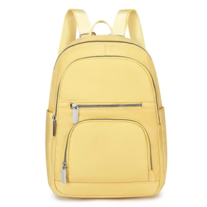 Minimalist bright yellow nylon backpack with dual zipper pockets and top handle