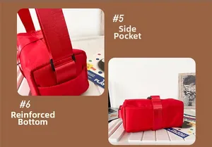 Detail view of red oxford shoulder bag showing side pocket and reinforced bottom base