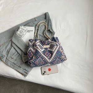 Geometric pattern canvas tote bag with leather handles and large capacity storage