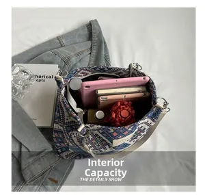 Top view of spacious tote bag showing internal capacity with tablet and notebook