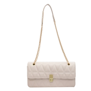 Quilted cream chain shoulder bag for women with golden metal lock and elegant flap