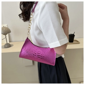 Metallic pink faux leather underarm bag with crocodile texture and gold chain strap