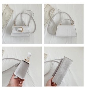 Détails du sac à main blanc à motif crocodile avec boucle dorée et bandoulière réglable