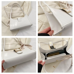 Detail views of cream white quilted underarm bag with gold buckle and floral silk scarf