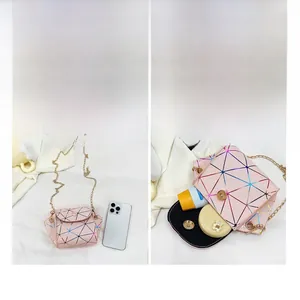 Pink holographic crossbody bag showing internal storage for phone and cosmetics