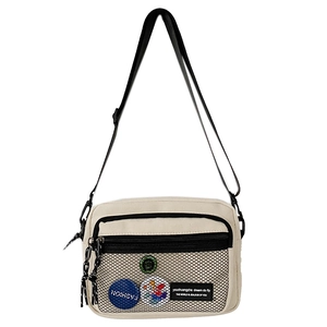 Japanese style cream canvas crossbody bag with mesh pocket and adjustable strap