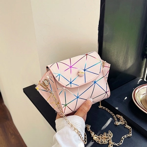 Pink holographic geometric chain crossbody bag with modern metallic texture and gold strap