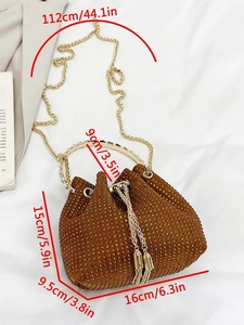 Detail view of brown rhinestone bucket bag with dimensions 16x15x9.5cm and chain strap