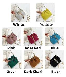 Multiple colors of sparkling rhinestone bucket bags with gold handles and chain straps