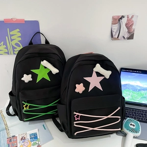 Y2K style star backpack with star pattern and plush charm for school and travel
