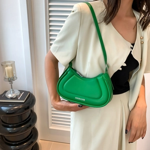 Minimalist green crescent leather underarm bag with decorative stitching for women