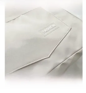 Detailed macro view of the fashion nylon fabric texture with silicone brand label
