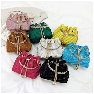 Showcase of eight vibrant colors for the sparkling rhinestone drawstring bucket handbag