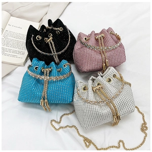 Chic evening bucket bags in four colors featuring rhinestones and gold ring handles