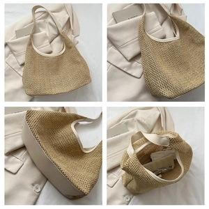 Vista dettagliata della borsa tote in paglia con finiture in pelle crema e interno spazioso