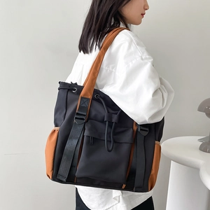 Large capacity color-block shoulder tote bag with utility pockets for school and commute