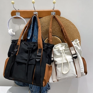 Minimalist large capacity color block canvas tote bag for students in black and beige