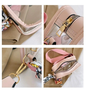 Detail shots of pink transparent PVC crossbody bag with silk scarf handle and gold hardware