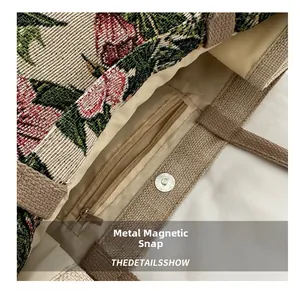 Detail of vintage floral tote with metal magnetic snap and inner zipper pocket
