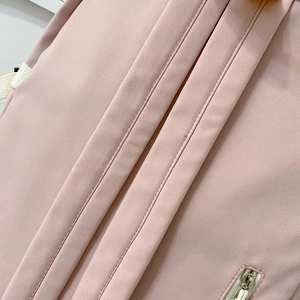 Detail of pink backpack with clean stitching and high-quality metal zipper teeth