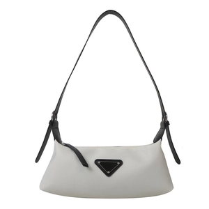 Minimalist white nylon underarm bag with black leather straps and triangular emblem