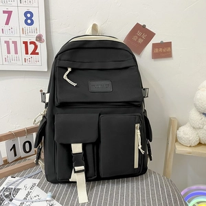 Black waterproof student backpack with multiple pockets for laptops and school essentials
