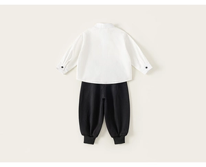 Rear view of white cotton long-sleeved shirt and black trousers for boys school uniform