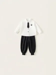 Classic kids white long sleeve shirt with black tie and matching joggers set
