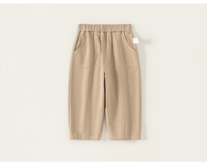 Detailed flat lay of khaki cotton casual trousers for boys with elastic waistband and pockets