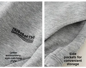 Detail of grey kids sweatpants featuring precise letter embroidery and functional side pockets