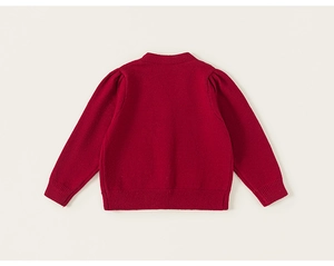 Detailed back view of red girls' knitted cardigan featuring subtle puff sleeves and ribbed hem