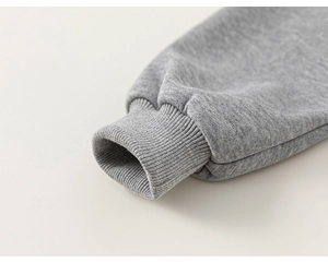Close-up of gray sweatshirt ribbed cuffs with elastic knitted cotton fabric detail