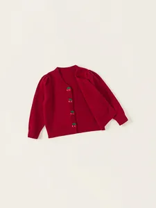 Girls red knit cardigan sweater featuring unique cherry-shaped buttons and ribbed cuffs
