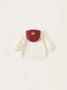 Veste coupe-vent à capuche pour enfants beige et bordeaux avec détail d'étoile jaune