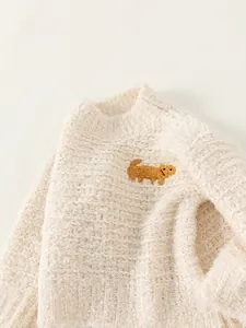 Kids cream mock neck knit sweater featuring a yellow cartoon dog embroidery patch