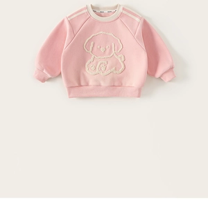Detail of pink toddler sweatshirt featuring a fuzzy puppy patch and sporty white stripes