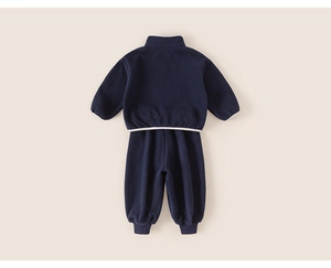 Rear view of deep blue children's two-piece tracksuit with white contrast piping details