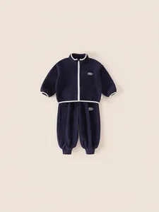 Dark blue fleece tracksuit for kids featuring a zipper jacket with white contrast trim