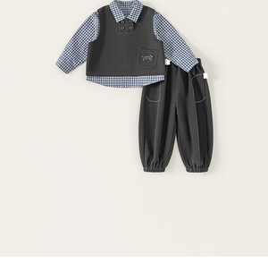 Close-up of boys' 3-piece casual suit featuring double-breasted vest and cat embroidery