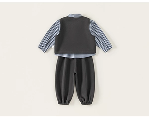 Detail of boys' three-piece formal suit with blue checkered shirt and grey vest
