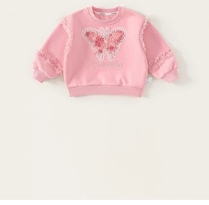 Detail of pink girls sweatshirt featuring butterfly embroidery with pearls and sequins