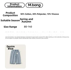 Detail view of denim blue girls' jeans showing 50% cotton fabric and sizing information